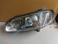 ľavé predné svetlo na opel omegu B, lift, 98-, 5527091-E